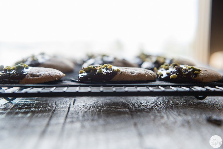 chocolate dipped peppermint and dark chocolate cookies with pistachios